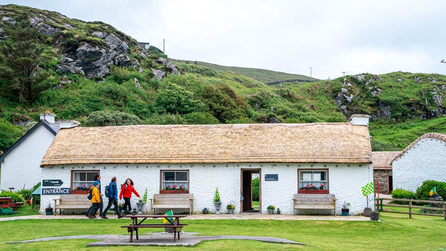 People visiting Glencolmcille Folk Village in Co Donegal